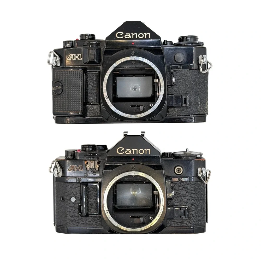 Lot of 2 Canon A-1 35mm SLR Film Camera Body Black Vintage Tested - For Parts